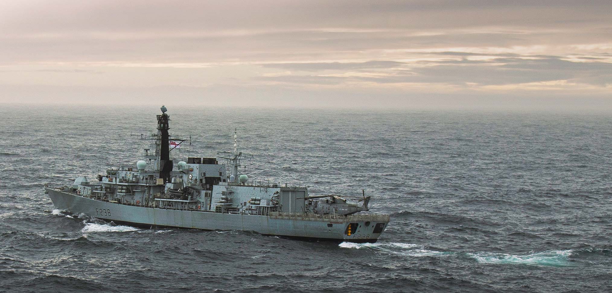 HMS Northumberland gets up close with a Russian submarine