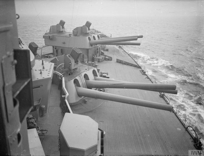 16_inch_gun_turrets_and_Unrotated_Projectile_launchers_on_HMS_Nelson_1940_IWM_A_1994[1].jpg
